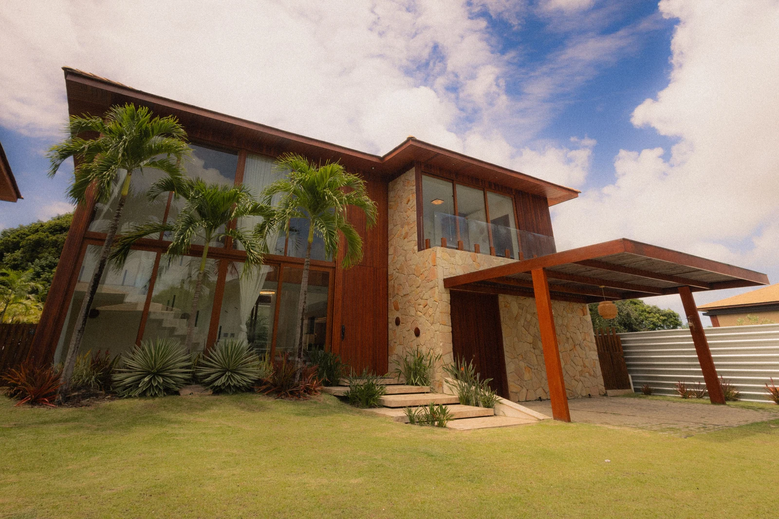 Modern tropical luxury residence used as editorial context for relocation housing.