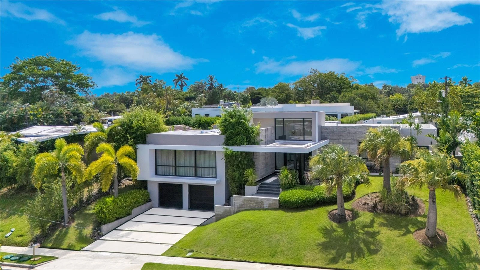 Contemporary residence with tropical landscaping, supplied as a Guaynabo visual reference